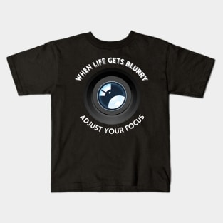 When life gets blurry, adjust your focus Kids T-Shirt